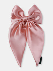 Close-up of pastel pink Satin Silk Hair Bow with a soft sheen, perfect for stylish and secure hair accessorizing.