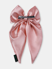 Back view of pastel pink Satin Silk Hair Bow showing secure clip attachment, designed for comfort and elegance.