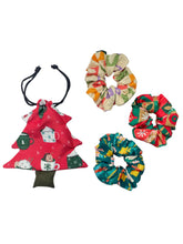 Christmas Glitter Hair Accessories set with festive scrunchies and a red Christmas tree pouch. Ideal for girls' holiday outfits and gifts.