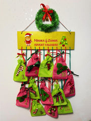 Personalized Advent Calendar Girls - 12 Day Countdown features pink and green numbered pouches with festive bows and charms, perfect for gifting.