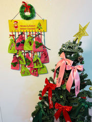 Christmas-themed Personalized Advent Calendar Girls - 12 Day Countdown displayed beside a decorated tree, ideal for holiday home decor.