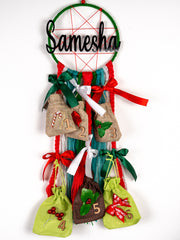 Personalized 6-Day Dreamcatcher Christmas Advent Calendar featuring red, green, and beige pouches with festive icons. Unique holiday decor gift.