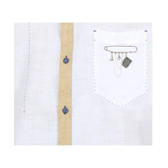 Harry Potter inspired silver brooch worn on shirt pocket