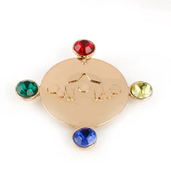 Colorful gemstone Sailor Moon brooch worn on hand