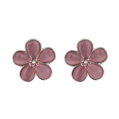 Close-up of pink flower earrings with rhinestones for jewelry accessories