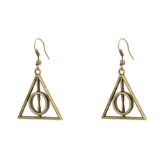Gold Harry Potter Deathly Hallow earrings on model