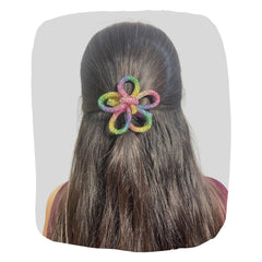 Multicolor flower-shaped rhinestone bow hair clip for girls, handmade and secure, ideal for stylish hair accessorizing.