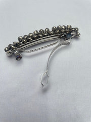 Back view of Navratri Ghungroo Hair Pin showing secure metal clasp. Ideal hair accessory for girls during Navratri celebrations.