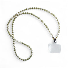 Full view of Navratri Pearl Phone Sling featuring elegant white pearls and a clear phone attachment for ceremonial outfits.