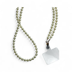 Close-up of handcrafted Navratri Pearl Phone Sling with universal phone holder, designed for festive traditional wear.