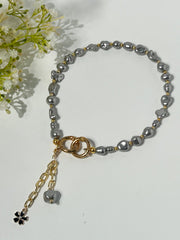 Lumba, Reimagined — Smoke & Gold | 4-in-1 Baroque Pearl Lumba Rakhi