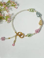 Lumba, Reimagined — Pastel Mosaic | 4-in-1 Baroque Pearl Lumba Rakhi