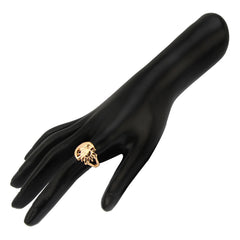 Black mannequin hand with gold ring