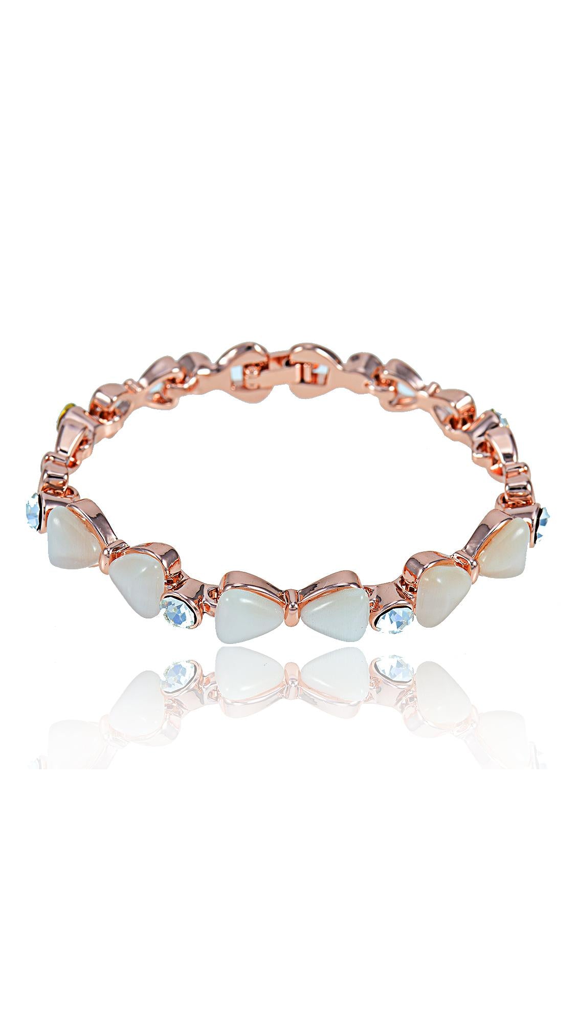 Bow Bracelet Opal Women featuring imitation opal stones and delicate bow accents in a rose gold finish. Lightweight and adjustable for elegant wear.