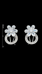 Cubic Zirconia and Brass Flower Loop Silver Earrings with size reference, featuring floral motif and shimmering loop for fashion-forward accessorizing.