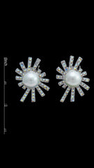 Close-up of Swarovski Pearl Stud Earrings with size scale, highlighting detailed crystal design and pearl centerpiece for jewelry shoppers.