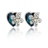 Genuine Swarovski Elements Blue Heart and Studded Flower Earrings featuring deep blue heart crystals and sparkling floral studs in silver-tone setting.