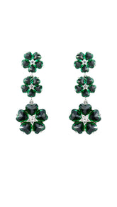 Cubic Zirconia Green Emerald Dangle and Drop Earrings with floral design on white background. Elegant jewelry set for formal and casual wear.