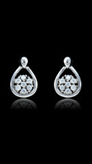 925 sterling silver and rhinestone stud earrings featuring a teardrop shape and clustered sparkle, displayed on black background for luxury appeal.