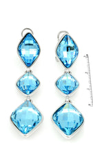 Genuine Swarovski Elements Blue Dangle and Drop Earrings featuring three square-cut crystals in silver-tone settings. Elegant jewelry for formal wear.