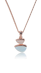 Imitation opal pendant with rose gold chain featuring a minimalist double-drop design. Elegant and versatile for everyday or formal wear.