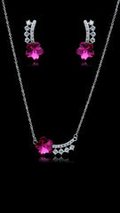 Genuine Swarovski Pink Flower Jewelry Set with sparkling crystals on silver-tone chain and earrings, perfect for elegant occasions.