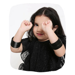 Young girl wearing Arendelle's Traditional Metal Bangles Set in black, showcasing stylish jewelry for kids in the Apparel & Accessories category.