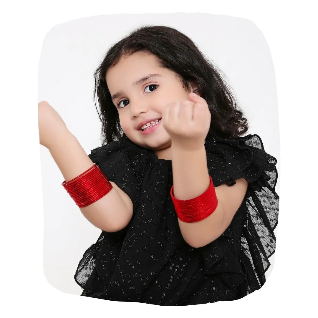 Young girl wearing Red Metal Bangles Set 36 Pcs - Elegant Traditional Bangles, styled for festive or daily wear in Apparel & Accessories > Jewelry.