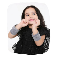 Child wearing Grey Velvet Bangles Set - Traditional Jewelry, 48 Pcs in stylish design, perfect for festive and casual wear.