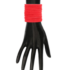 Red Velvet Bangles displayed on mannequin hand, highlighting the elegant fit and smooth velvet finish for jewelry styling.
