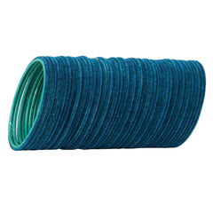 Close-up of 48-piece Greenish Blue Velvet Bangles Set. Rich velvet finish enhances festive jewelry collections in apparel accessories.
