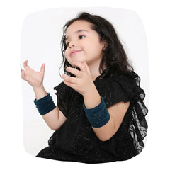 Young girl wearing Greenish Blue Velvet Bangles Set from 48 Pcs collection, ideal for festive wear. Stylish accessory in Apparel & Accessories > Jewelry.