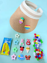 Creative Summer Cap Kit includes a straw visor, colorful pom-poms, star shapes, and fun cartoon accessories for kids' DIY craft play.