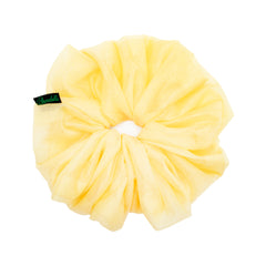 Chic yellow organza scrunchie by Arendelle with soft sheer texture, perfect hair accessory for teens and adults alike.
