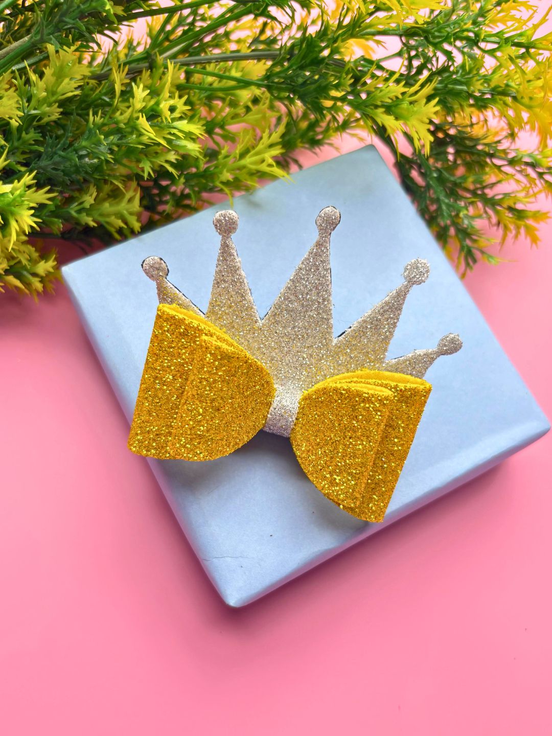 Gold and silver Glitter Princess Crown Hair Bow displayed on a gift box, ideal for festive styling and Christmas-themed girls' accessories.