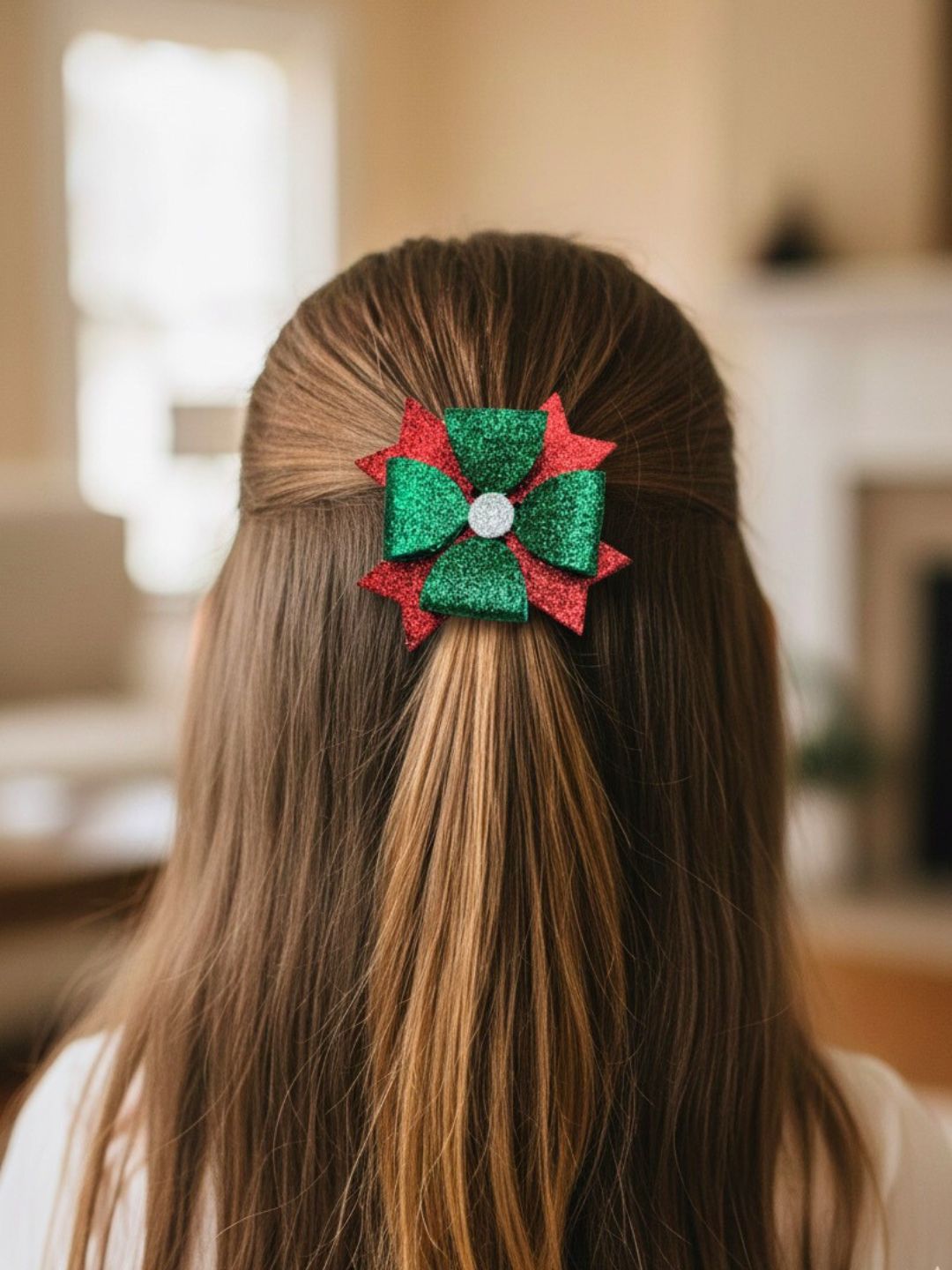 Girl wearing Arendelle Christmas Glitter Hair Bow, highlighting its vibrant red and green sparkle for holiday-themed hairstyles.