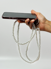 Arendelle Navratri Special White Pearl Phone Sling