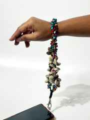 Navratri Ghungroo & Kodi Shell Phone Wristlet – Festive Garba Wrist Strap