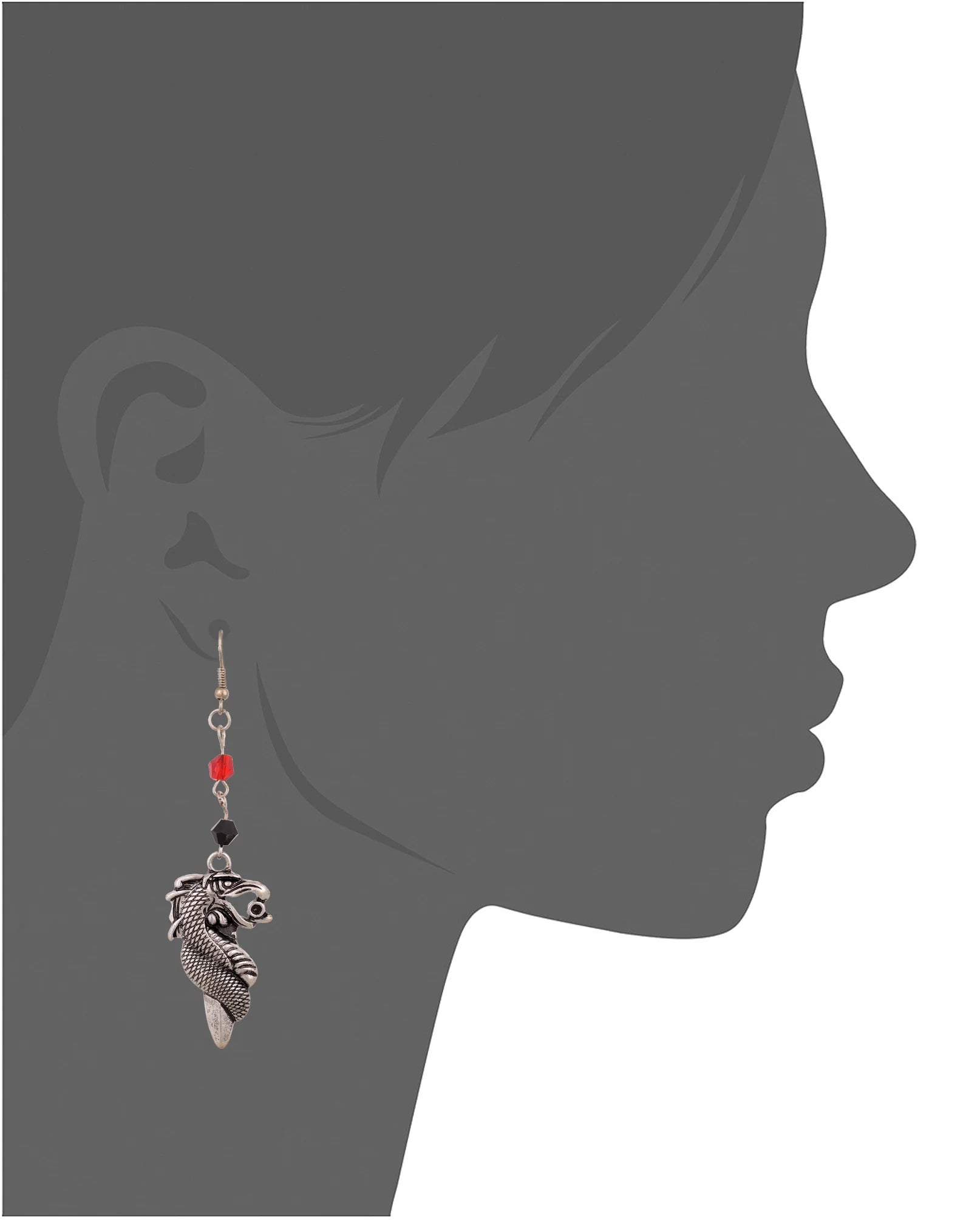 Fashionable dragon earrings on a woman's ear