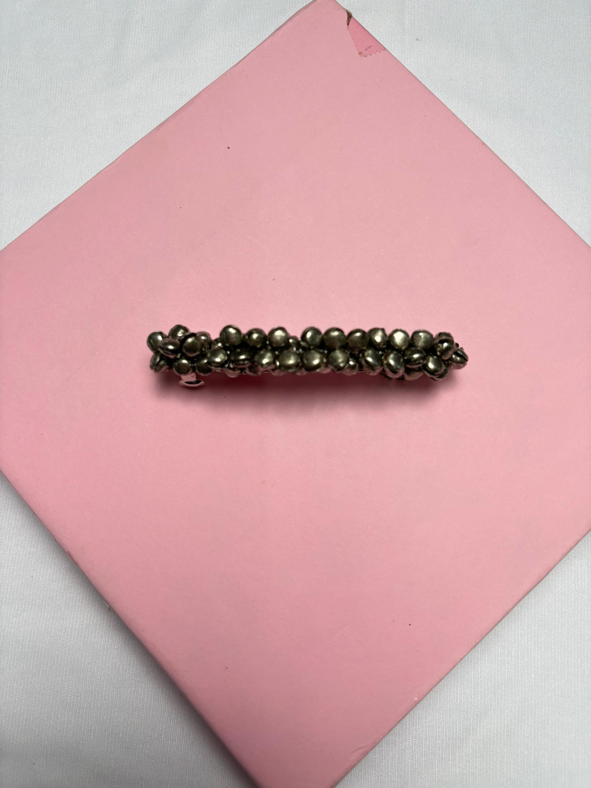 Navratri Ghungroo Hair Pin for girls featuring metallic ghungroo beads on a clip, perfect for Garba dance and festive hair styling.