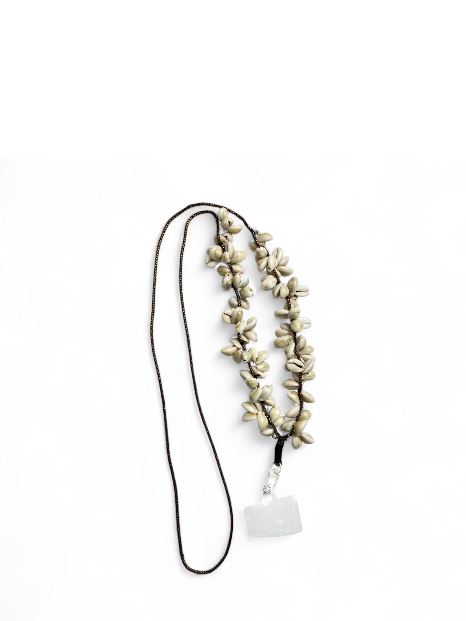 Full view of Arendelle Navratri Special Kodi Phone Sling with cowrie shell accents and phone attachment, ideal for festive occasions.