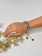 Lumba, Reimagined — Smoke & Gold | 4-in-1 Baroque Pearl Lumba Rakhi