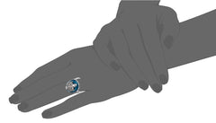 Model wearing blue gemstone Vampire Diaries support ring jewelry